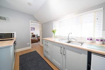 The kitchen is light and airy.
