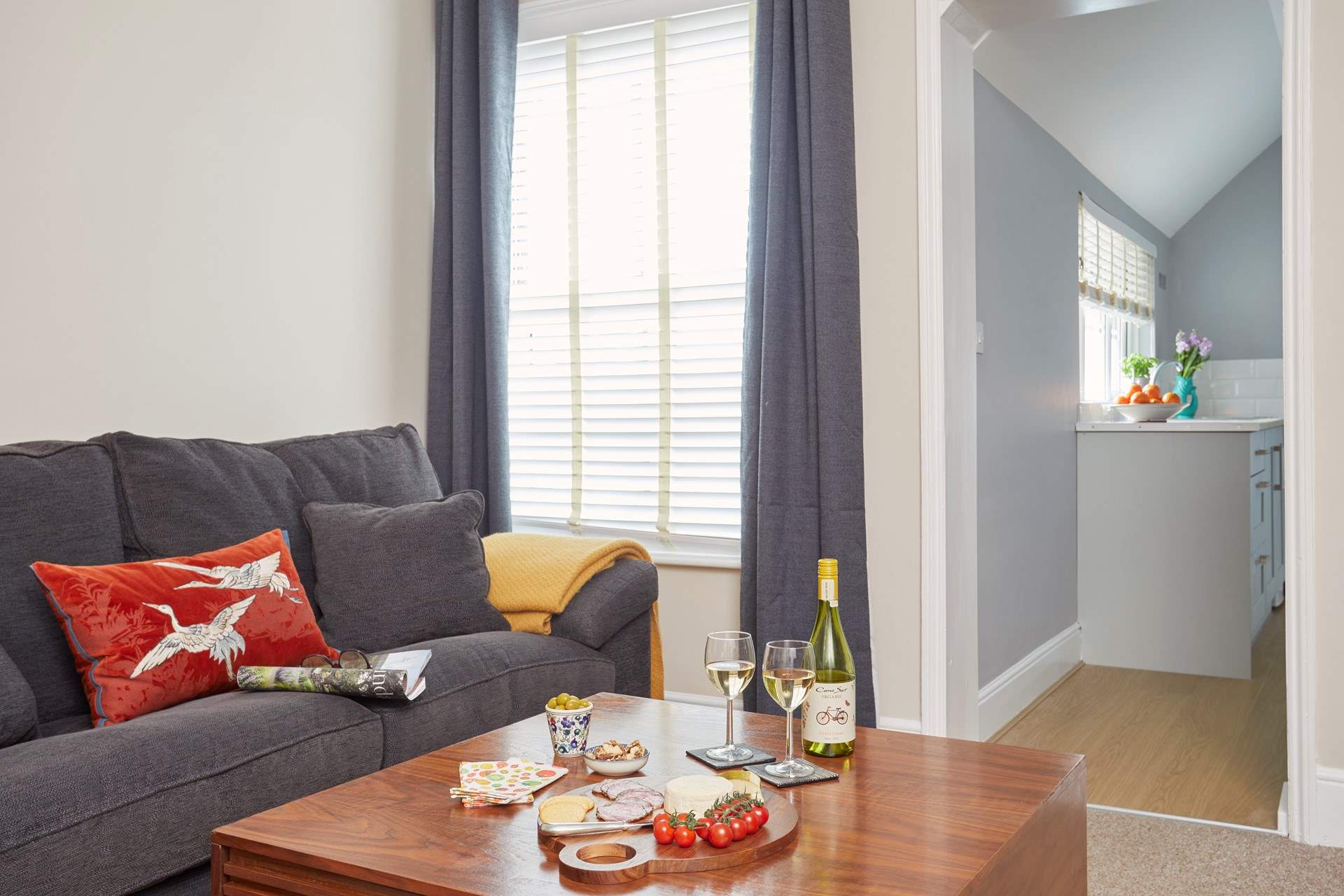There is lots of natural light coming through the windows in the sitting/dining-room and kitchen.