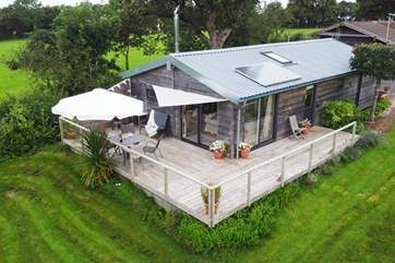 This ariel shot shows the fabulous decked area in all its glory, with the owner's tool shed beyond.