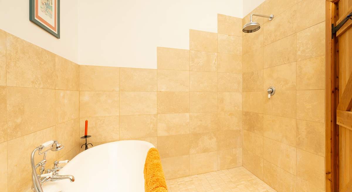 As well as the roll-top bath there is a fabulous wet-room style rainfall shower.