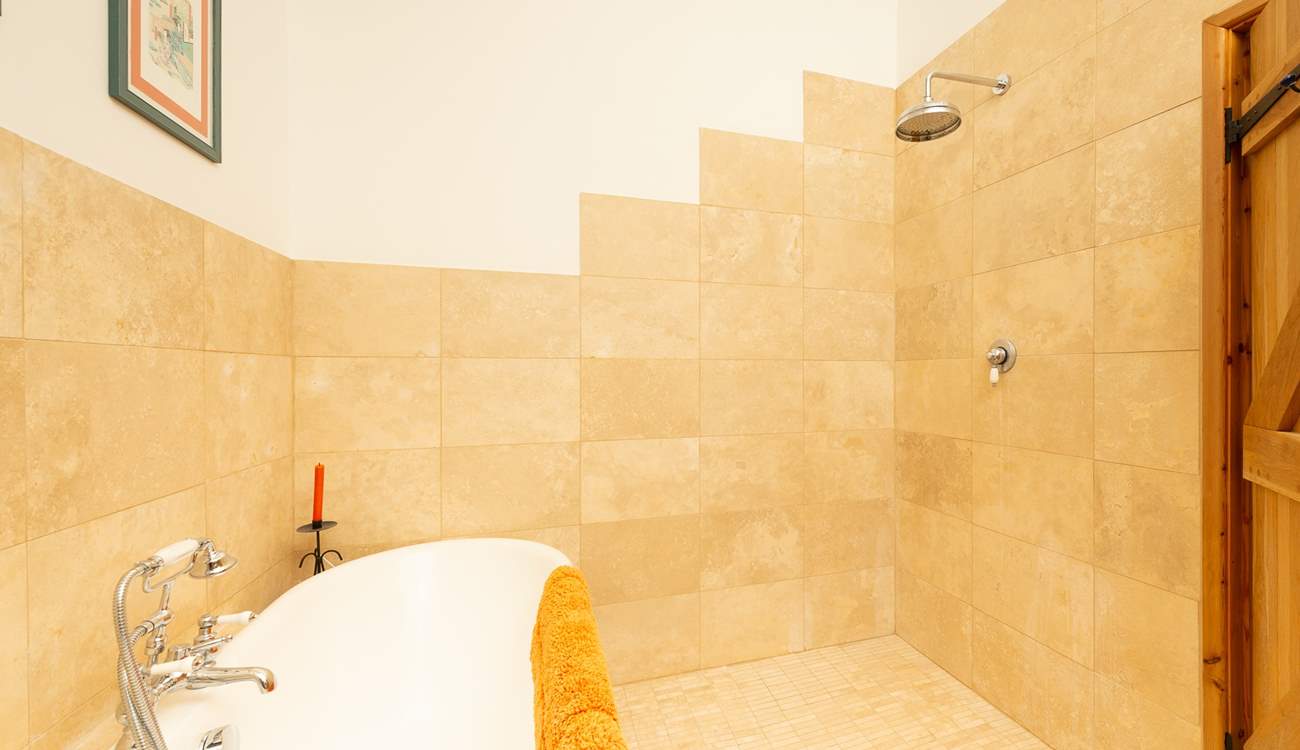 As well as the roll-top bath there is a fabulous wet-room style rainfall shower.