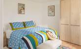 This bedroom can be set up as twins or a super-king bed (Bedroom 3) and it shares the same view as the main bedroom, over the sea and to Kynance Cove.  - Thumbnail Image