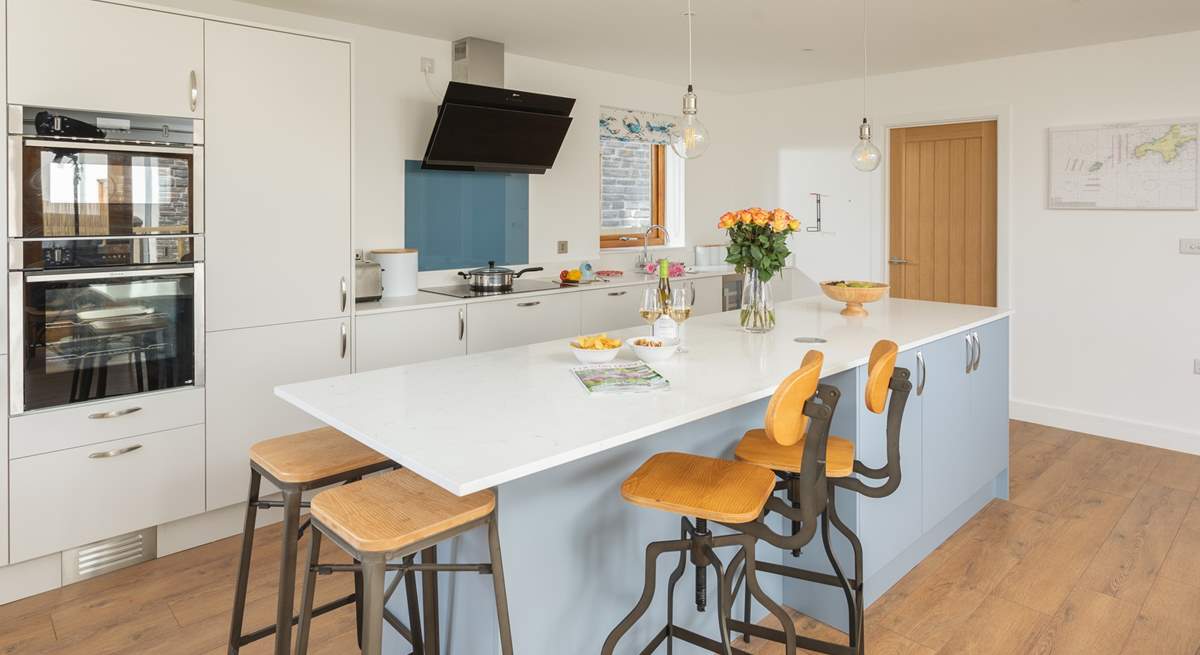 The kitchen is really well-equipped and even has a wine fridge. 