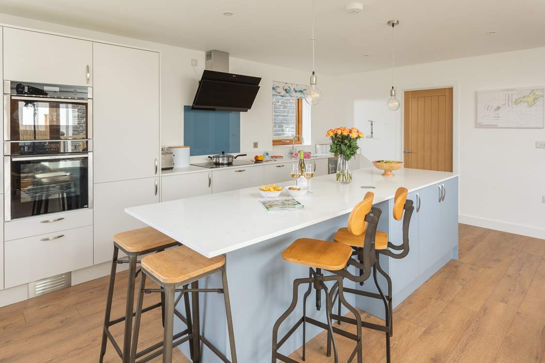 The kitchen is really well-equipped and even has a wine fridge.