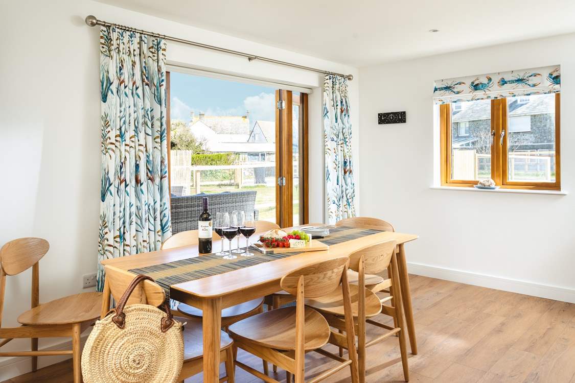 Open the double doors to the patio for some fresh sea air.