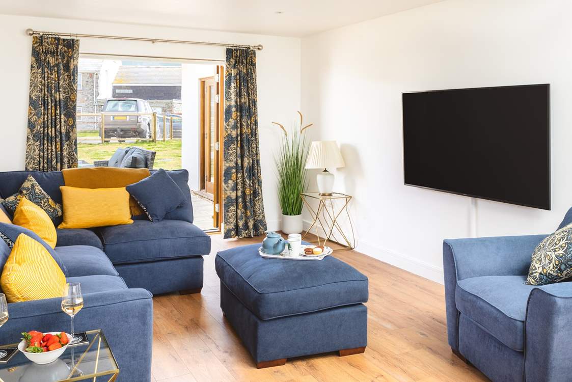 The double doors from the sitting-room open directly to the patio.