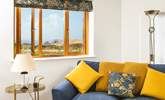 The sitting-room has views over Kynance Cove too.  - Thumbnail Image