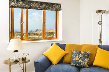 The sitting-room has views over Kynance Cove too.