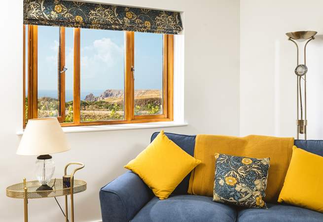 The sitting-room has views over Kynance Cove too. 