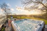 Relax in the bubbles and take in that view across the Glynn Valley.