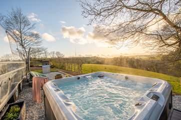 Relax in the bubbles and take in that view across the Glynn Valley.