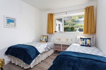 The bedroom has a lovely nautical vibe to it.