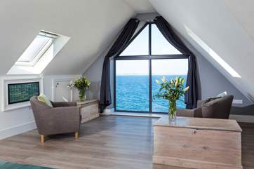 The gorgeous sitting area in the main bedroom. What a view to wake up to.
