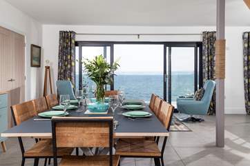 The large dining space that can easily accommodate up eight guests. Sit down for a long lazy lunch whilst the room is bathed in Cornish sun.