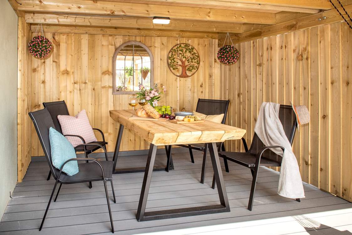 We simply love the sheltered dining-area.