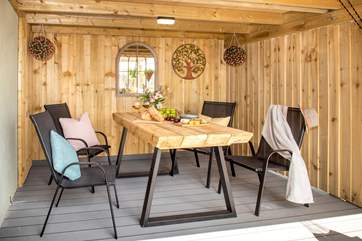 We simply love the sheltered dining-area.
