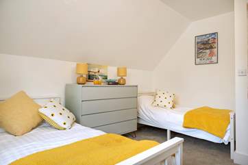 The pretty twin bedroom.