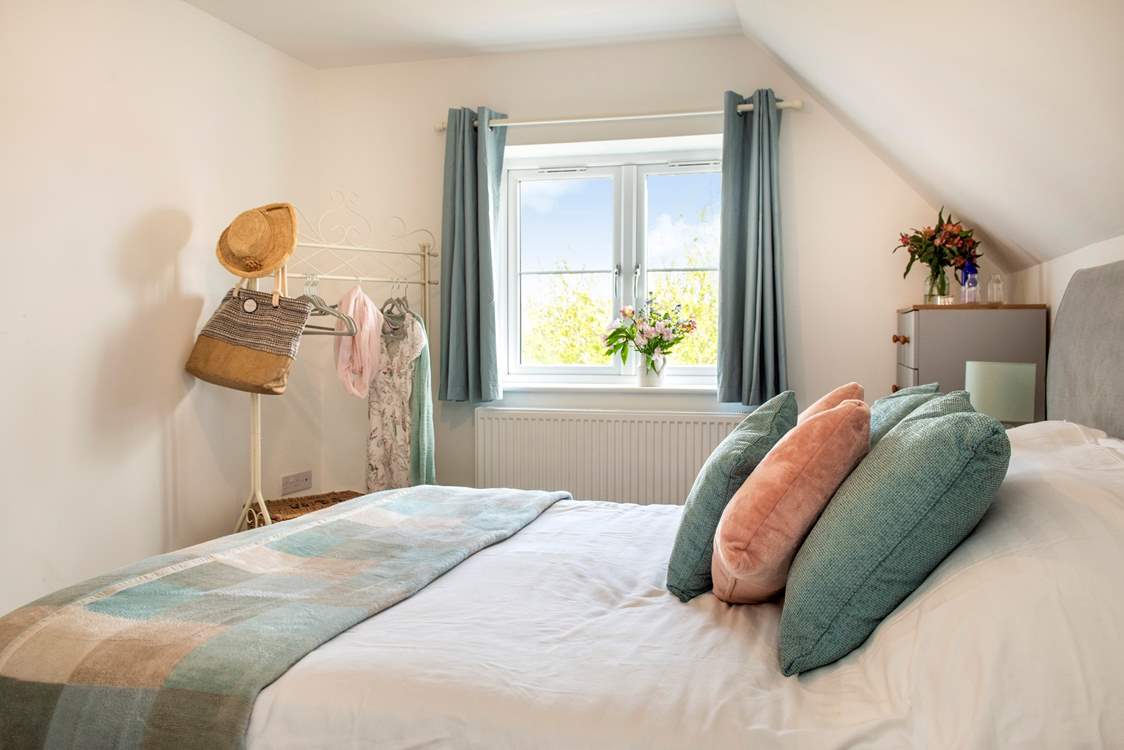 Bedroom 1 offers a super-comfy king-size bed.
