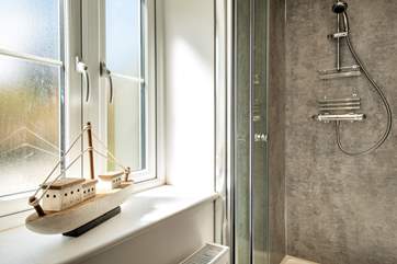and the family bathroom also has a separate shower cubicle.