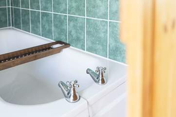 The family bathroom is the perfect spot to soak away your troubles.