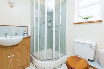 The downstairs shower-room sits off of the main entrance porch.