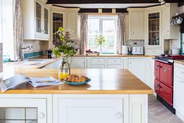 The heart of this cottage has to be this beautiful kitchen which enjoys the benefit of an oil-fired range cooker.