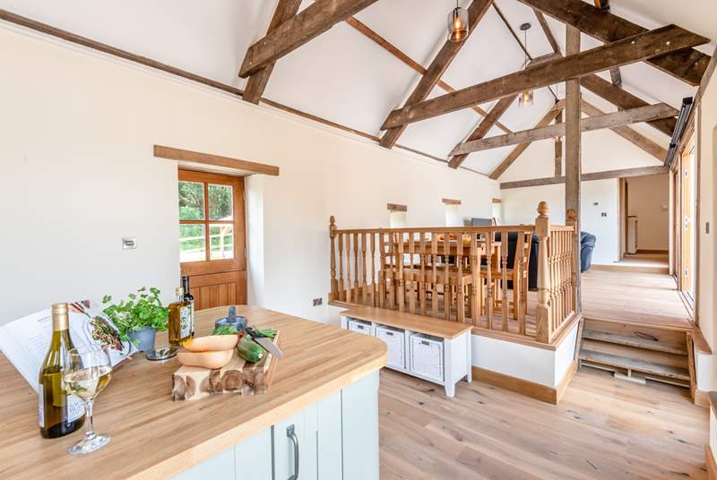 Olive Barn offers a wonderful social space with double height ceiling and re-claimed oak beams the perfect space to enjoy together.