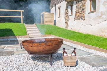 Gather around the fire-pit in the evening sunshine.