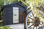 The kitchenette and shower room can be found in this purpose-built outhouse next to the yurt.