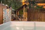 Just a few foot steps away from the yurt is the dreamy hot tub. No luxury spared! 