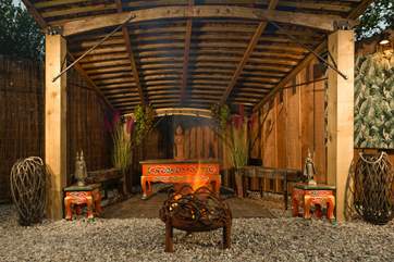 Sink into the romantic ambience and unwind around the fire pit.