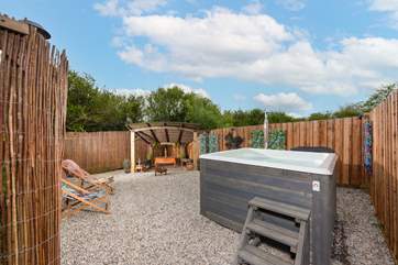 The added extra of the hot tub and fire pit area really adds something special to your retreat.