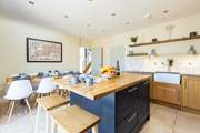 The dining area and kitchen, perfect for sociable family time.