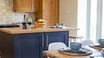 Cook up a storm in the well-equipped kitchen.