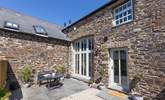 Outside the patio doors you'll find the perfect quiet spot. The barn is terraced but still offers total privacy at the front and back. - Thumbnail Image