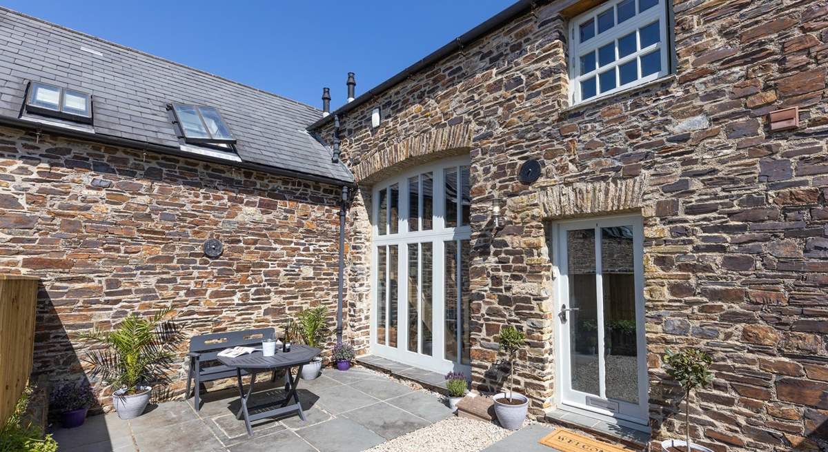 Outside the patio doors you'll find the perfect quiet spot. The barn is terraced but still offers total privacy at the front and back.