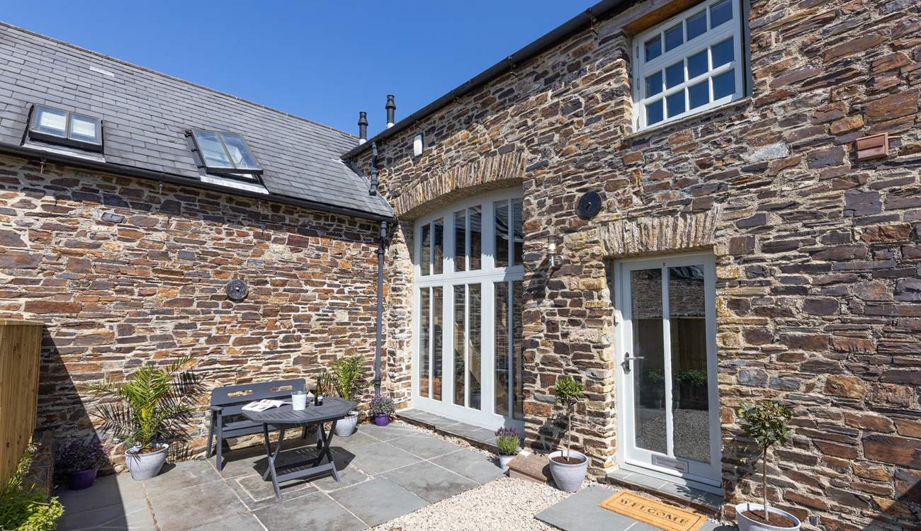 Outside the patio doors you'll find the perfect quiet spot. The barn is terraced but still offers total privacy at the front and back.