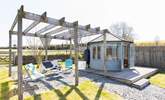 Take your pick of a seat under the pergola or in the summer-house. - Thumbnail Image