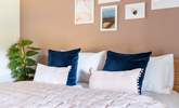 Sumptuous bedding awaits in the main bedroom. - Thumbnail Image