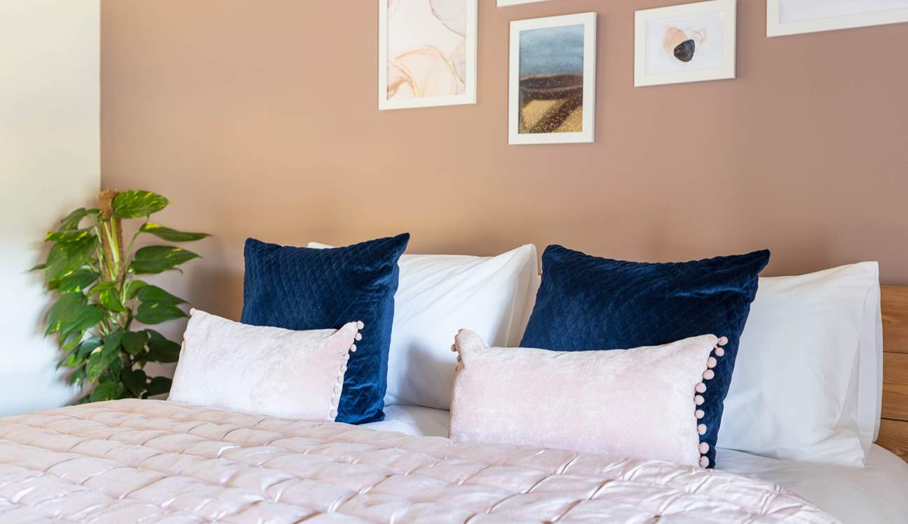 Sumptuous bedding awaits in the main bedroom.