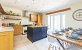 The light and airy kitchen/diner with patio doors to the garden. - Thumbnail Image