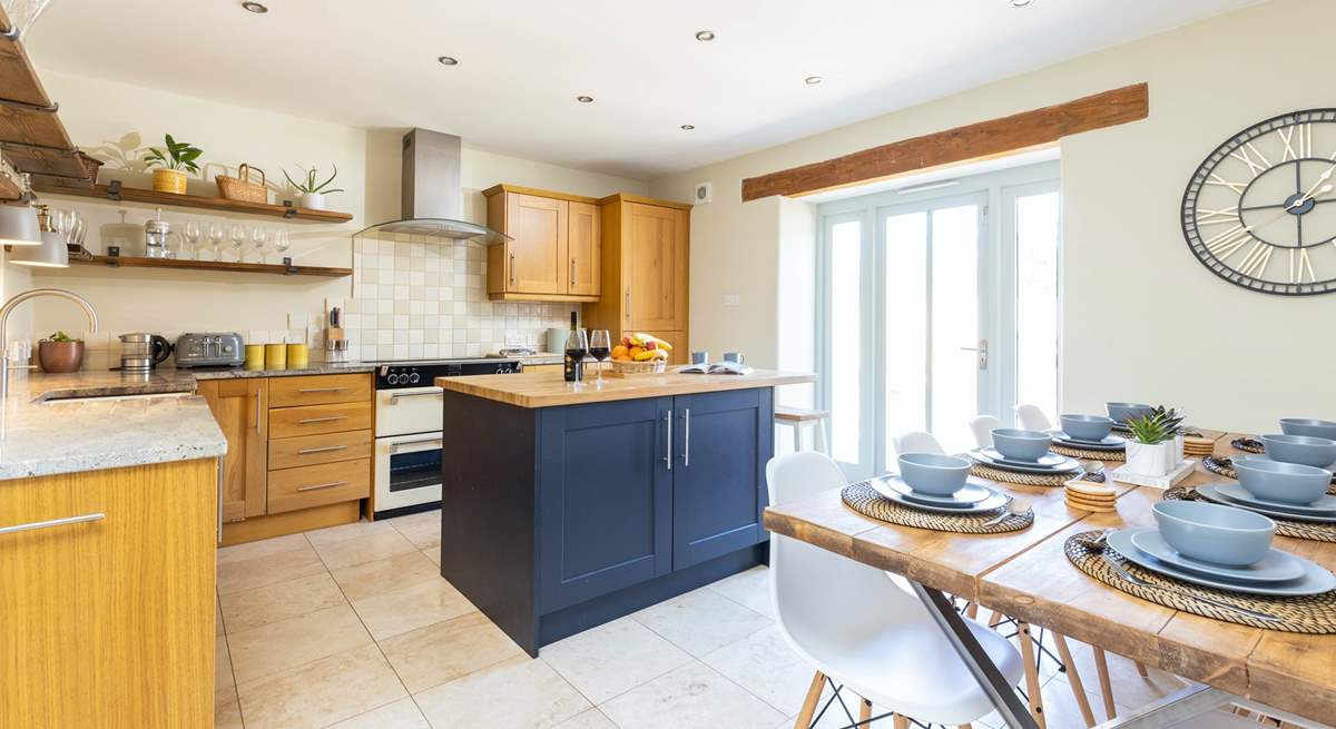 The light and airy kitchen/diner with patio doors to the garden.