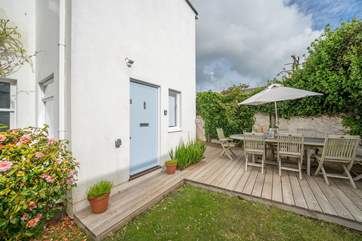 The decking with outdoor seating, a great sun trap perfect for al fresco dining.