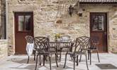 The sunny terrace is a lovely spot to enjoy holiday meals. - Thumbnail Image