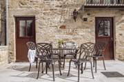 The sunny terrace is a lovely spot to enjoy holiday meals.