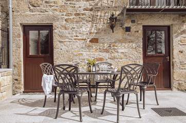 The sunny terrace is a lovely spot to enjoy holiday meals.