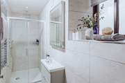 Bedroom 1 has a stylish en suite shower-room.