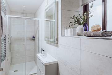 Bedroom 1 has a stylish en suite shower-room.