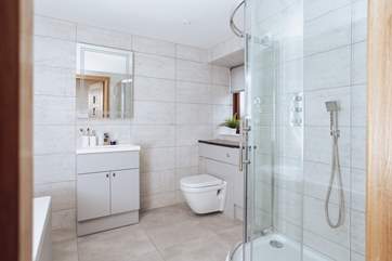 Bedroom 2 has a large en suite with a separate shower enclosure.
