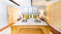 The beautiful super-king size bed in bedroom 1.